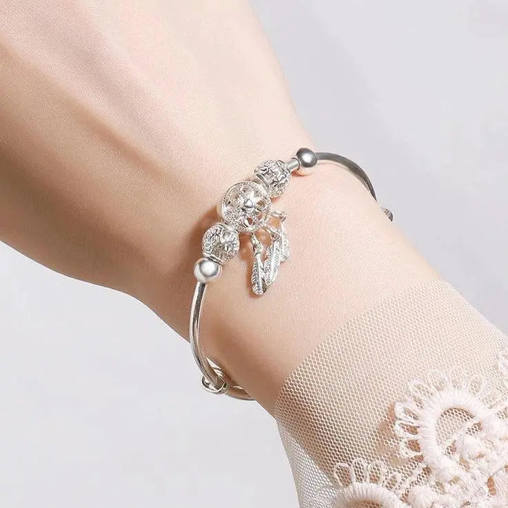 Bracelet ajustable avec trois breloques en forme de feuilles en argent sterling 925