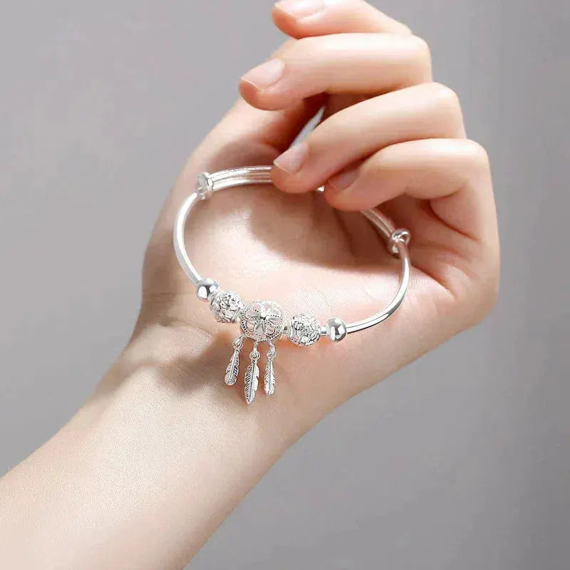Bracelet ajustable avec trois breloques en forme de feuilles en argent sterling 925