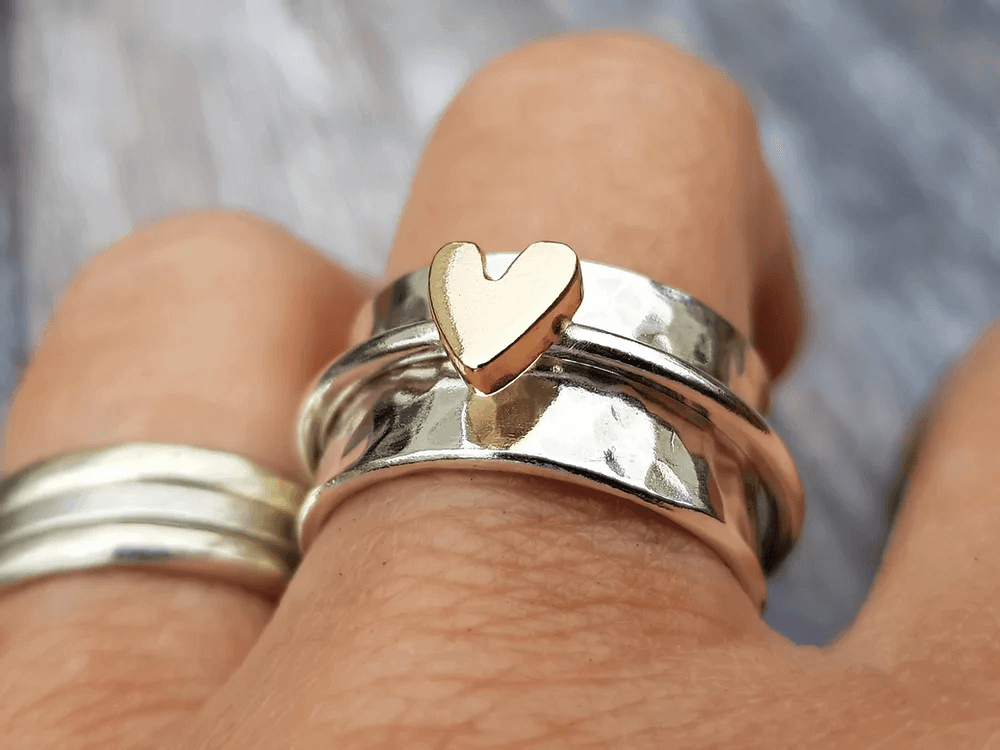 Bague en argent avec cœur doré