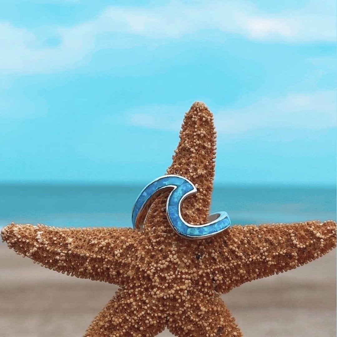 Bague Onda en argent avec opale bleue