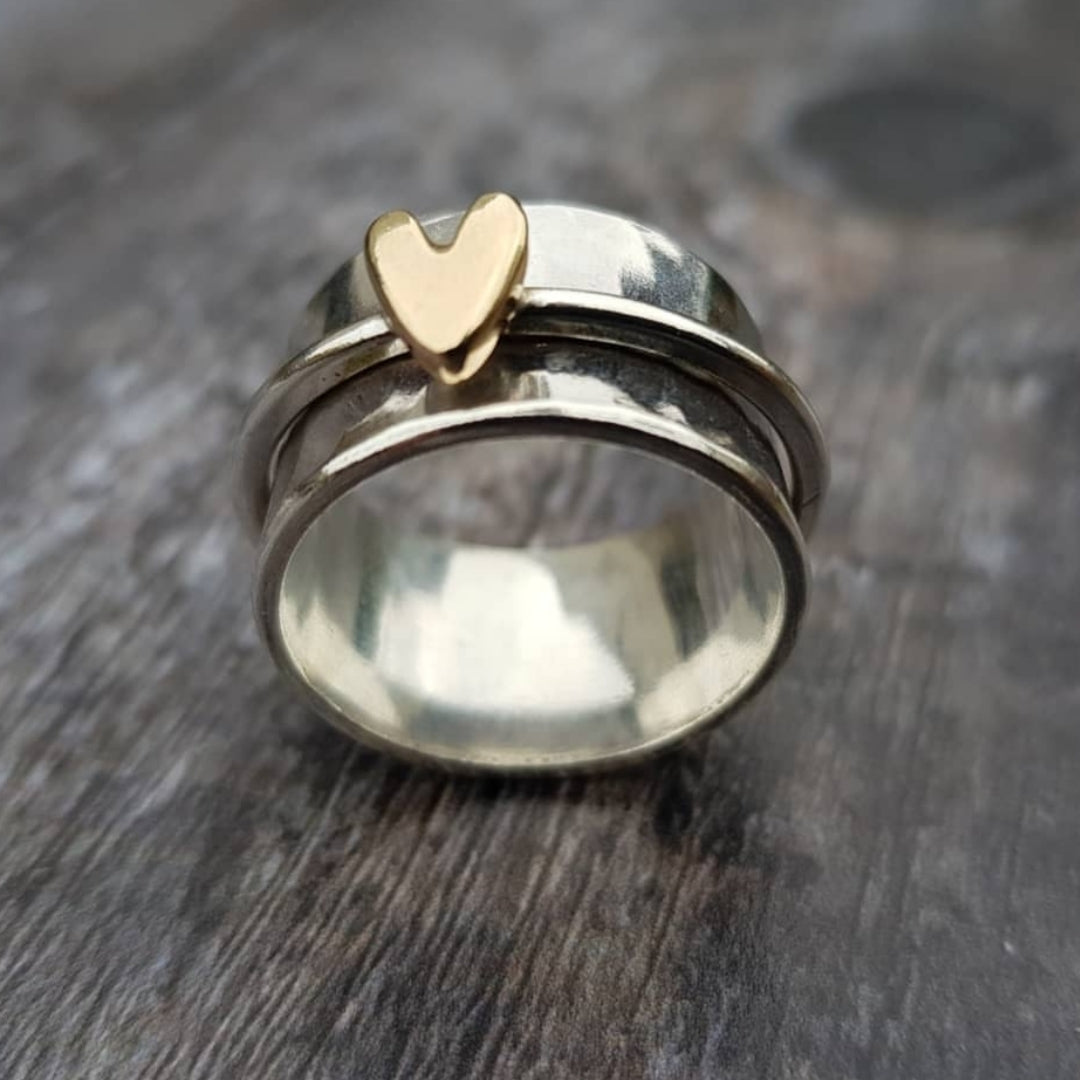 Bague en argent avec cœur doré