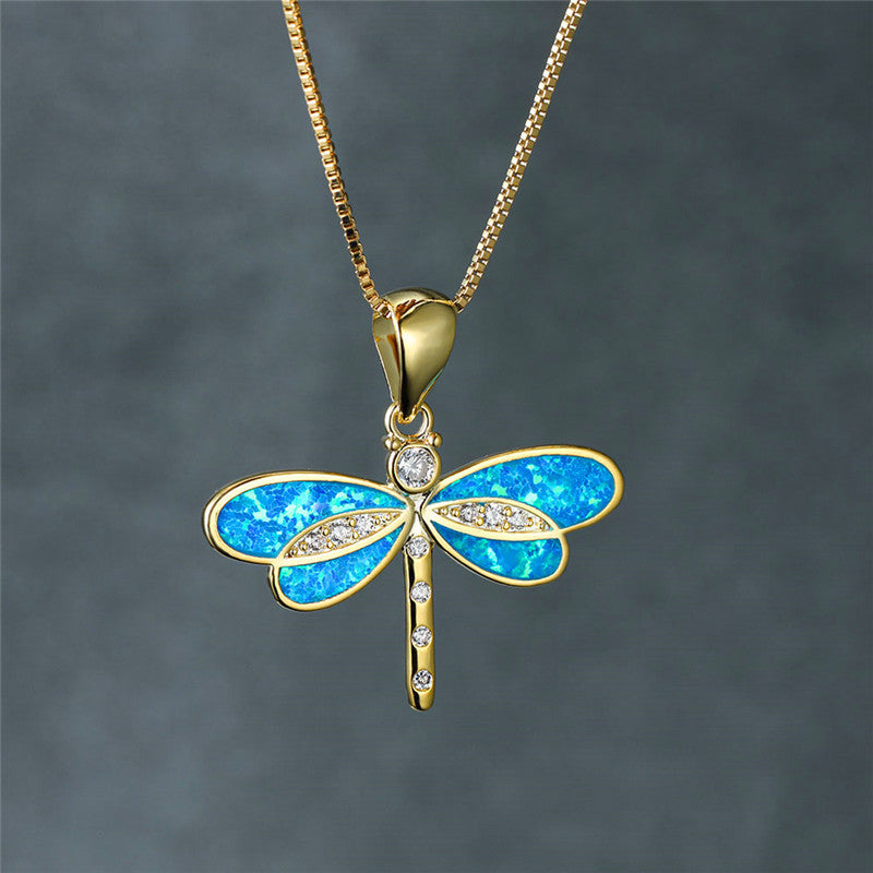 Collier libellule en or avec opale