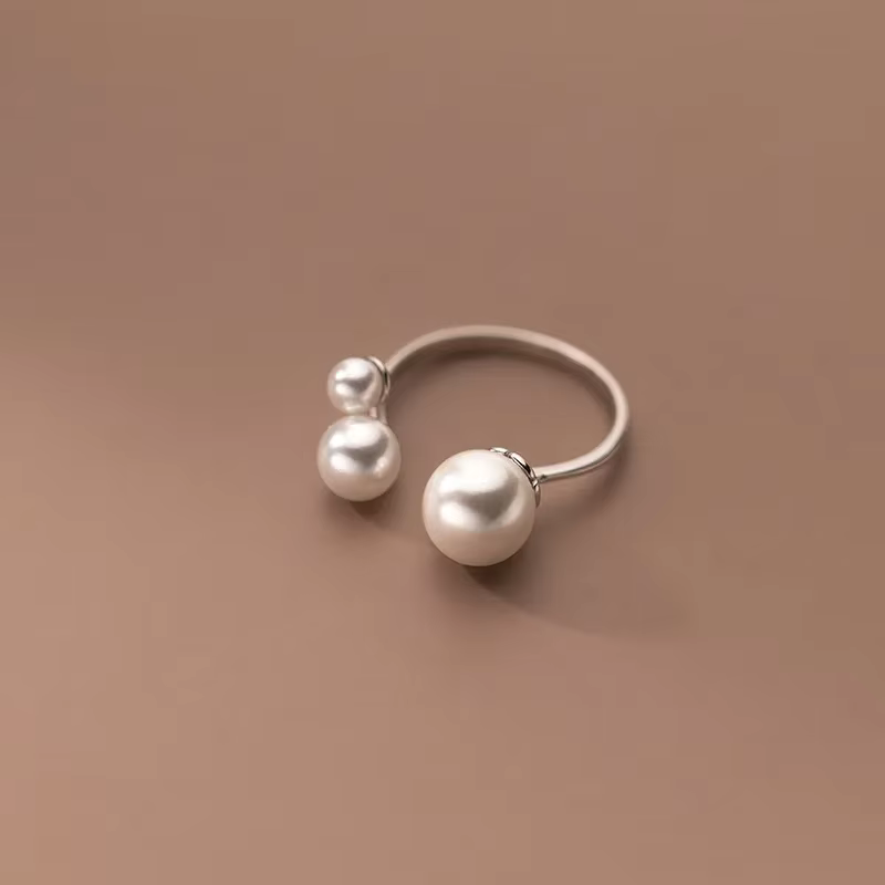 Bague ajustable à trois perles d&