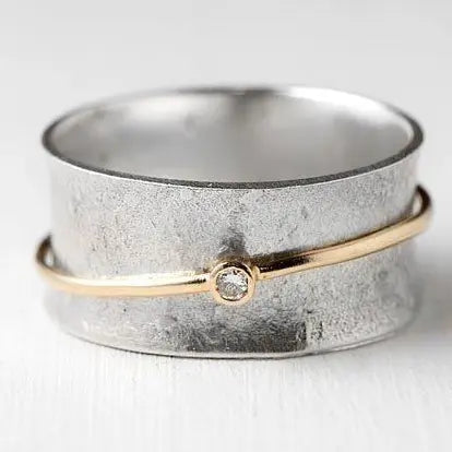 Bague vintage en argent avec zircone dorée